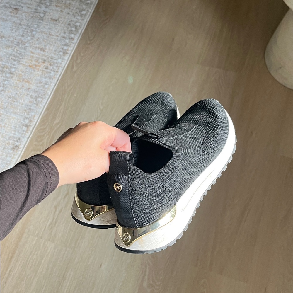 Black Slip-On Sneakers with Gold Accents